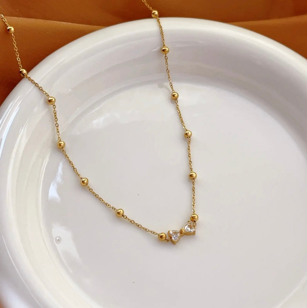 Beautiful Golden Beads Chain With Bow Design Pendant - Image 2